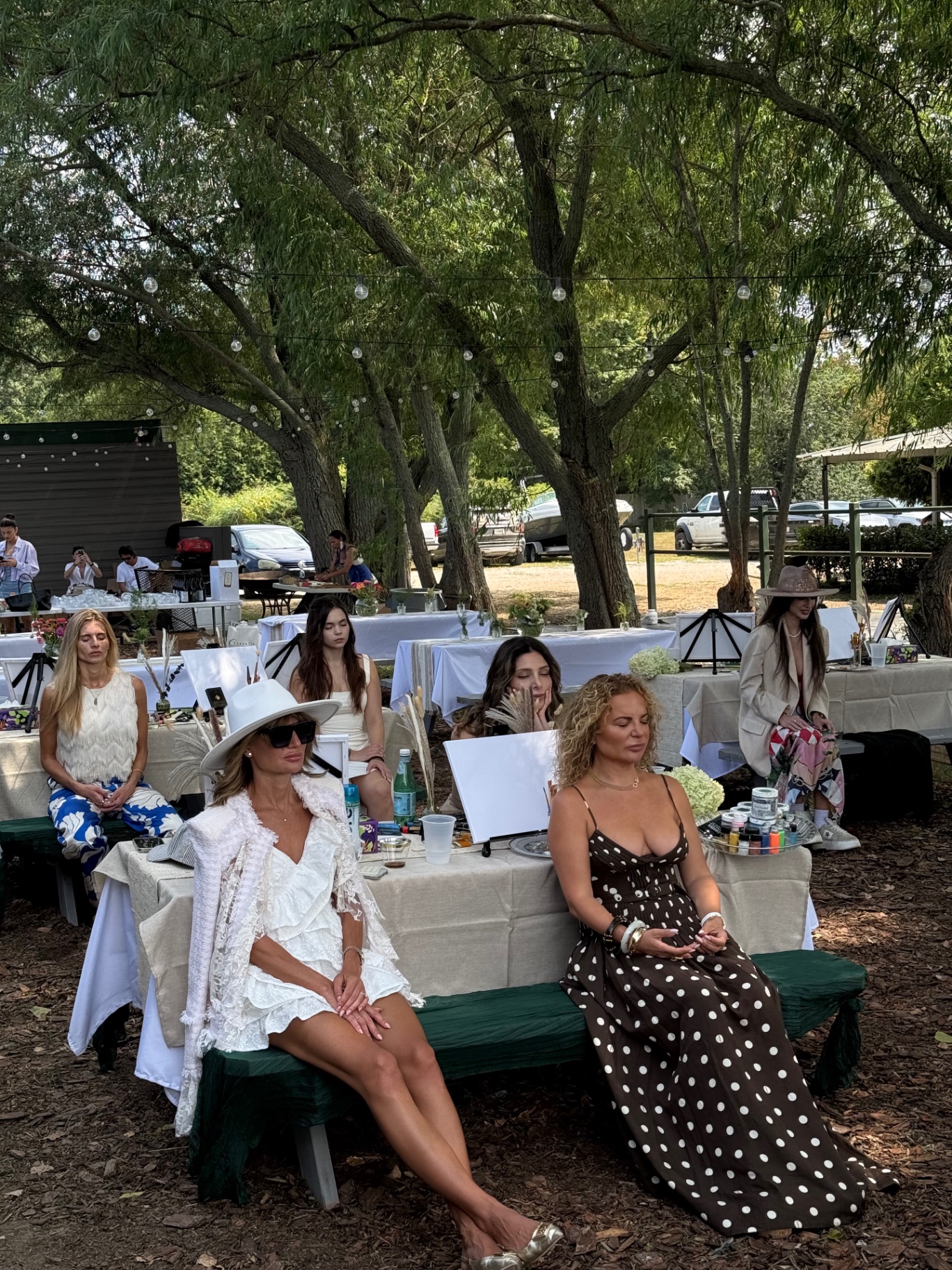 Guests seated in reflection at a previous ELARTĒ event